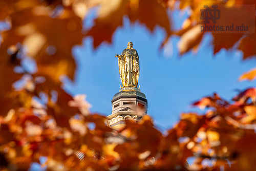 BJ 11.9.23 Statue of Mary 9294.JPG by Barbara Johnston/University of Notre Dame November 9, 2023; The statue of Mary atop the Golden Dome at sunset, autumn 2023. (Photo by Barbara Johnston/University of Notre Dame)