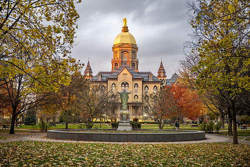 BJ 11.8.23 Main Building Autumn 9274.JPG by Barbara Johnston/University of Notre Dame November 8, 2023; The Golden Dome and Statue of Mary atop the Main Building glow at sunset, autumn 2023. (Photo by Barbara Johnston/University of Notre Dame)
