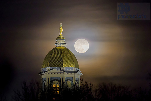 MC 12.3.17 Moonrise.JPG by Matt Cashore/University of Notre Dame December 3, 2017; Moonrise behind the Golden Dome (Photo by Matt Cashore/University of Notre Dame)
