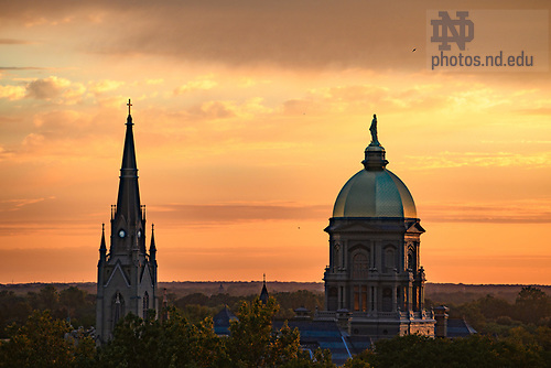 MC 9.24.23 Campus Skyline Sunset.JPG by Matt Cashore/University of Notre Dame September 24, 2023; Sunset behind the Basilica steeple and Golden Dome (Photo by Matt Cashore/University of Notre Dame)