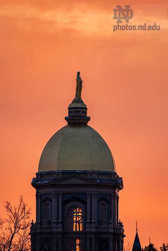 BJ 4.3.20 Campus Sunrise 915.JPG by Photo by Barbara Johnston/University of Notre Dame April 3, 2020; Main building at sunrise . (Photo by Barbara Johnston/University of Notre Dame)