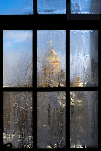 MC 1.20.24 Frosty Window.jpg by Matt Cashore/University of Notre Dame January 20, 2024; Dome through a Law School library window (Photo by Matt Cashore/University of Notre Dame)