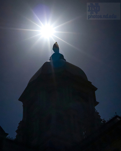 CS 4.8.24 Eclipse and Dome 02.jpg by Chris Schindler/University of Notre Dame April 8, 2024; A 97% solar eclipse over campus. (Photo by Chris Schindler/University of Notre Dame)