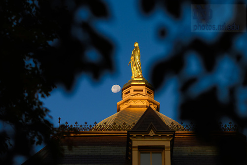 MC 10.2.23 Moonset.jpg by Matt Cashore/University of Notre Dame October 2, 2023; Moonset behind the Golden Dome (Photo by Matt Cashore/University of Notre Dame)