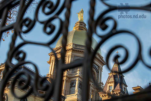 BJ 11.9.23 Golden Dome 9296.JPG by Barbara Johnston/University of Notre Dame November 9, 2023; The statue of Mary atop the Golden Dome at sunset, autumn 2023. (Photo by Barbara Johnston/University of Notre Dame)