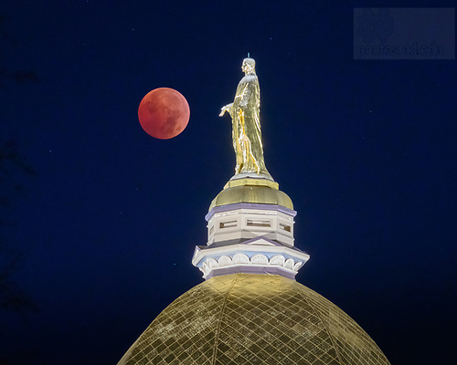 MC 11.8.22 Eclipse.jpg by Matt Cashore/University of Notre Dame November 8, 2022; Lunar eclipse as the moon sets behind the Dome. (Photo by Matt Cashore/University of Notre Dame)